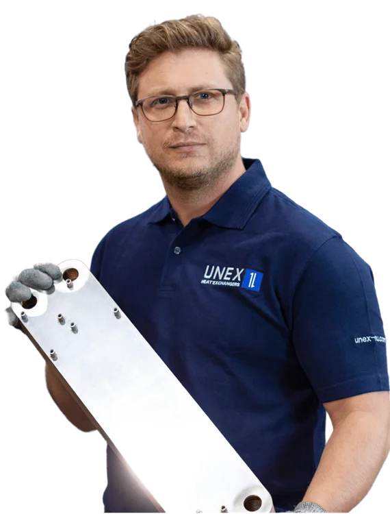 HEXCHANGE employee holding a plate heat exchanger